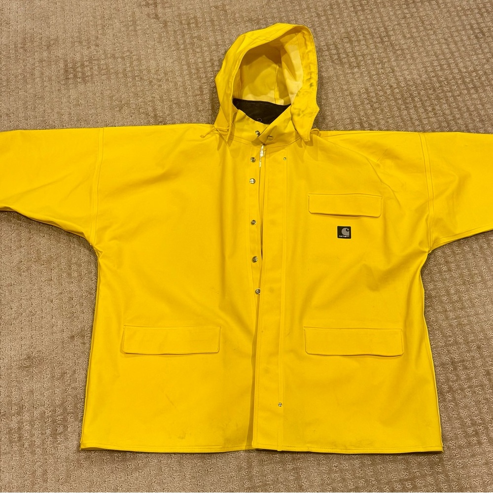 CARHARTT rain coat XL. Husband was a 2XL and it fit him!